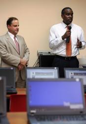 President of viNGN Larry Kupfer and Labor Commissioner Albert Bryan Jr. unveil the new computer center on St. Croix. President of viNGN Larry Kupfer and Labor Commissioner Albert Bryan Jr. unveil the new computer center on St. Croix.